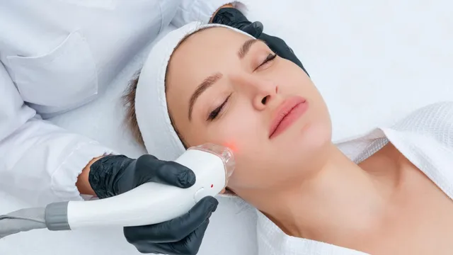 Aesthetician providing a facial treatment